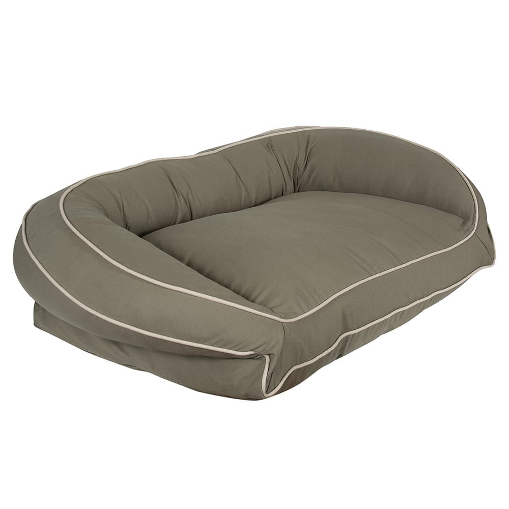 Brown pet bed with white trim on a white background