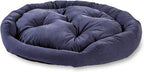 A round, tufted pet bed in a deep navy blue velvet fabric, shown on a plain white background.