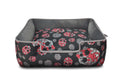 Dog bed with floral pattern on a white background