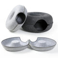 Gray pet house with two bowls on a white background