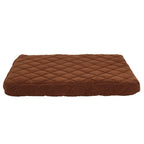 Brown quilted pet bed on a beige background