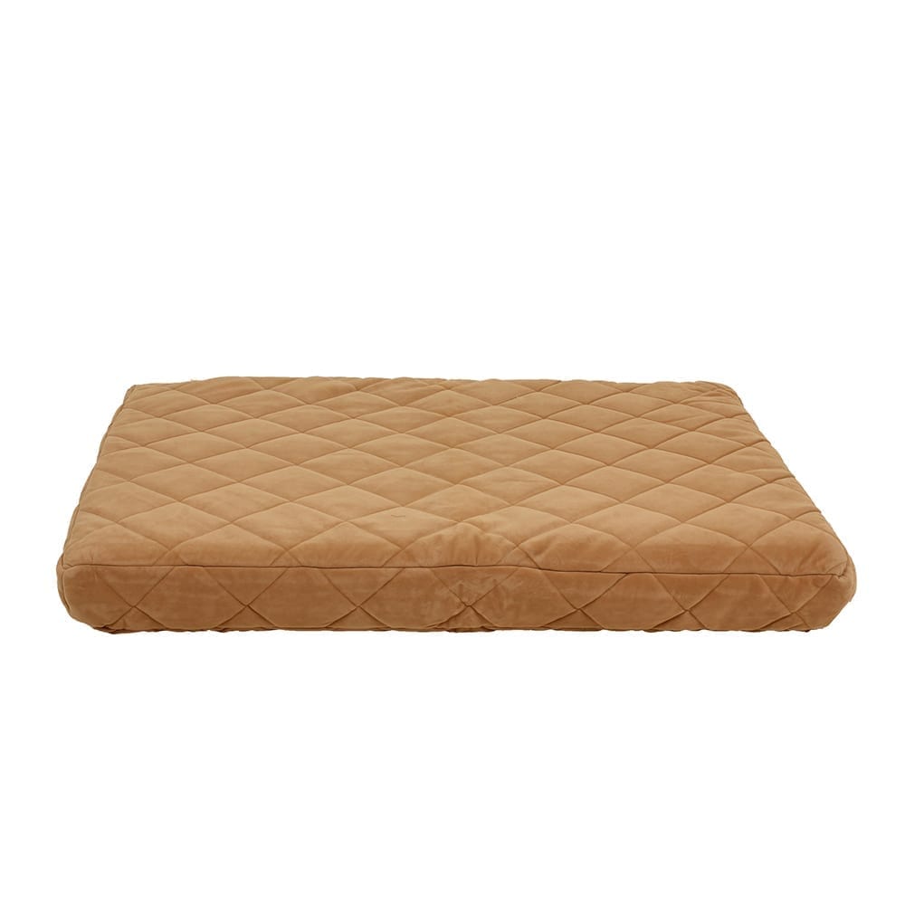 Brown quilted pet bed on a beige background